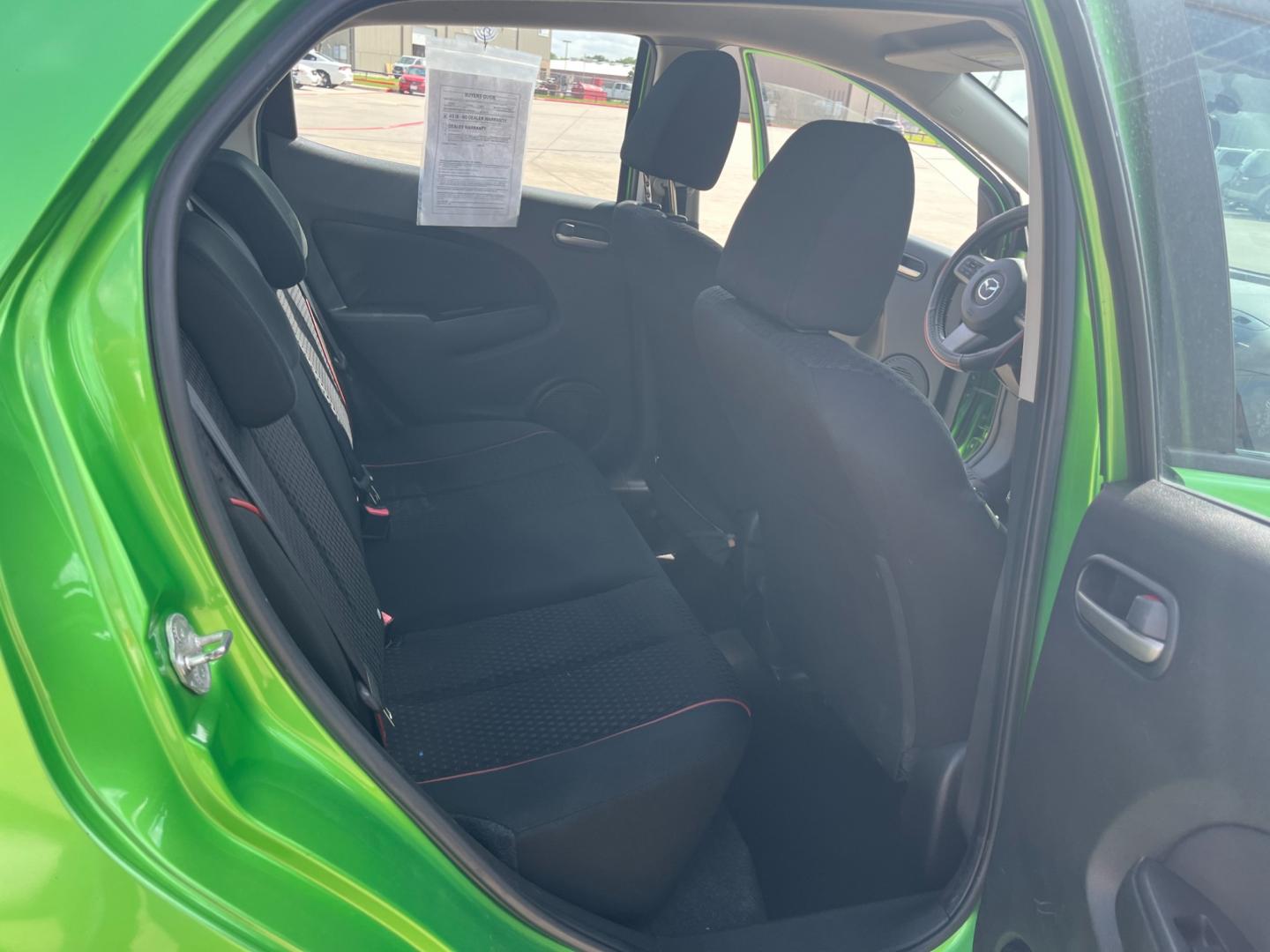 2013 green /black Mazda MAZDA2 Touring (JM1DE1LY1D0) with an 1.5L L4 DOHC 16V engine, Automatic transmission, located at 14700 Tomball Parkway 249, Houston, TX, 77086, (281) 444-2200, 29.928619, -95.504074 - Photo#12